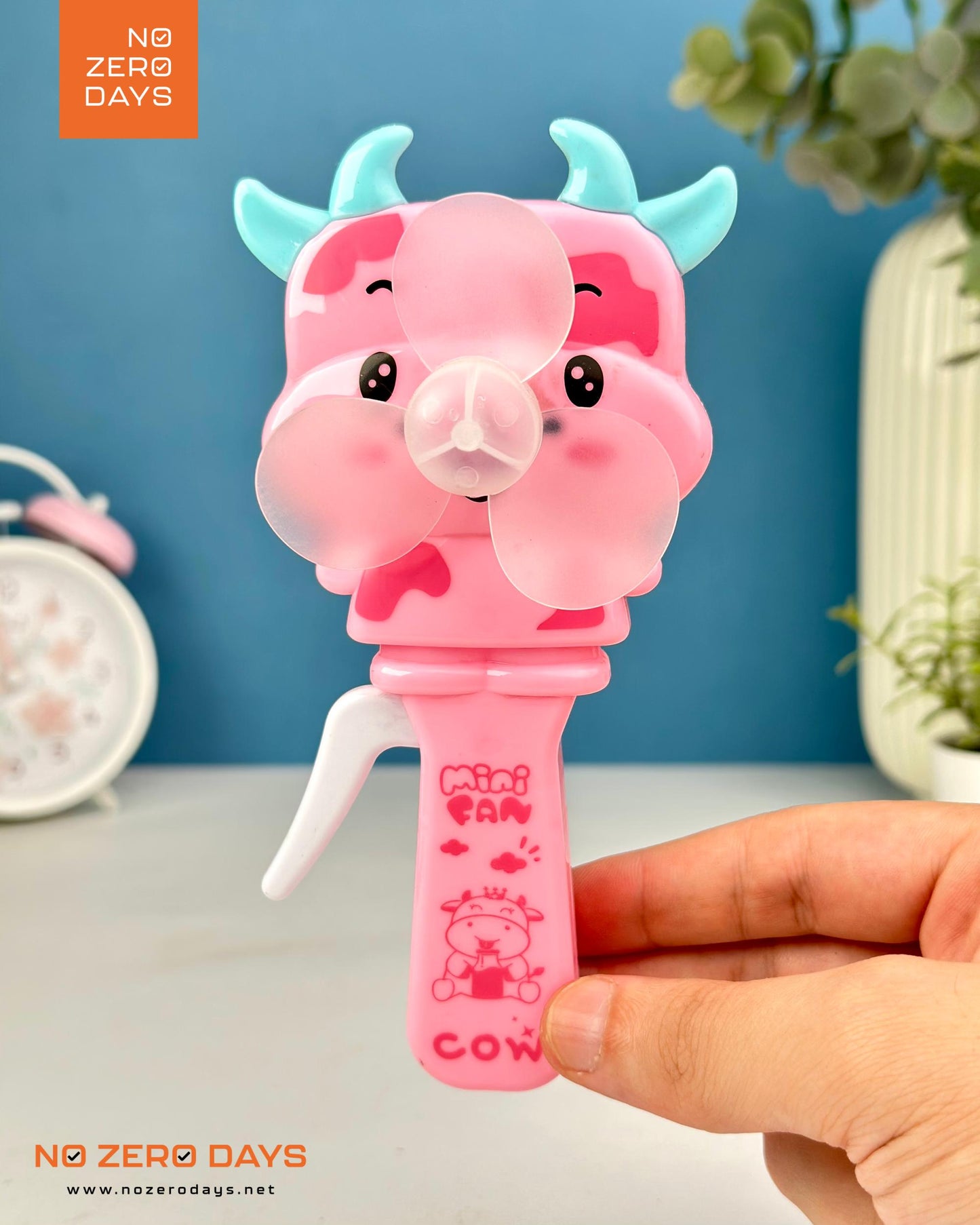 مروحة يد - بقرة